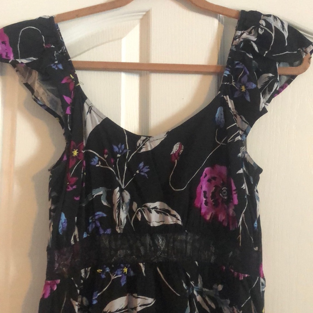 Floral dress. Knee length, flowy lace bottom